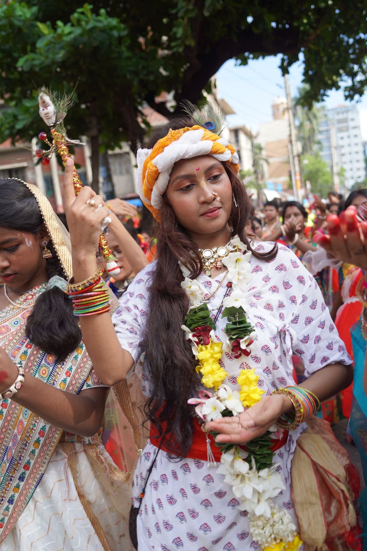Woman in traditional attire at an Indian festival celebration